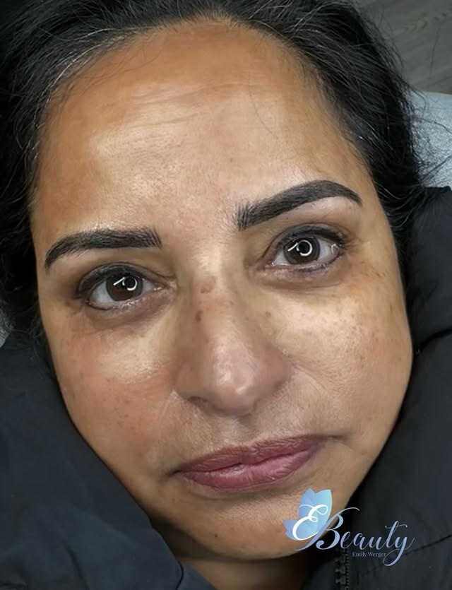 Healed ombré powder brows giving a soft, filled-in makeup look